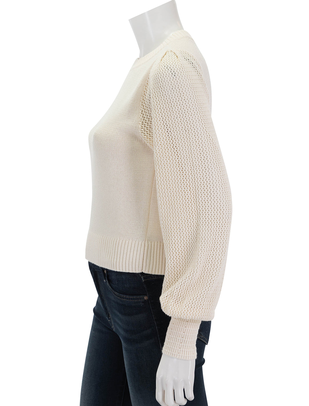 side view of pointelle sleeve crewneck sweater in cream