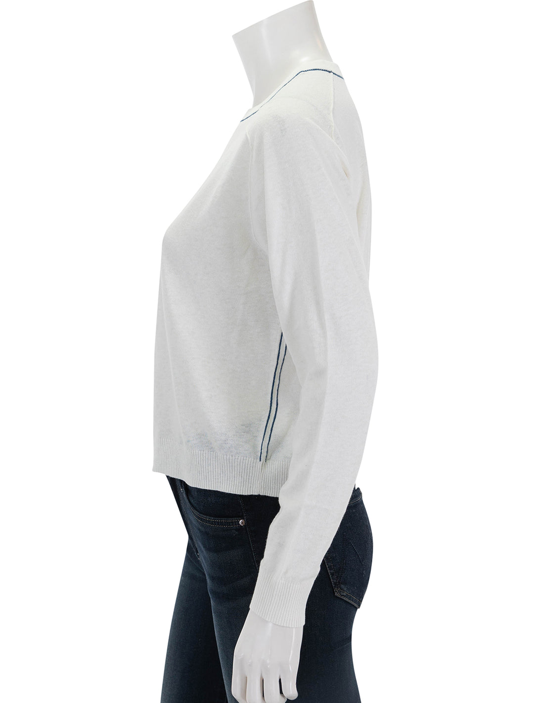 side view of oversized saddle sleeve sweater in antique white