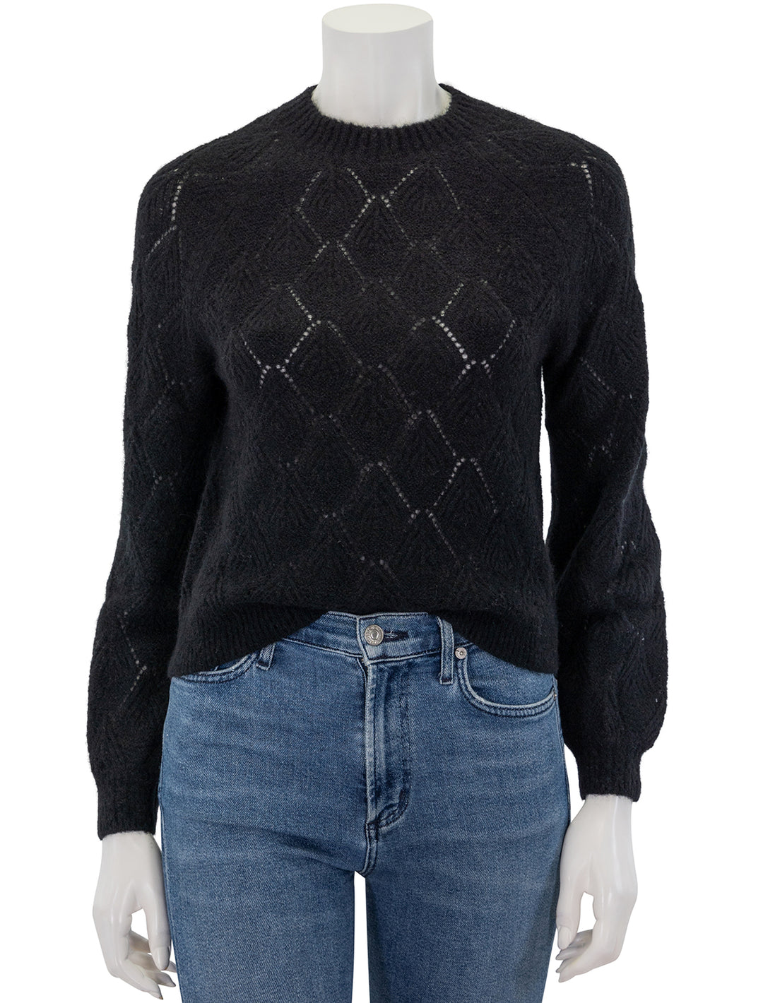 Front view of Lilla P.'s easy pointelle crewneck sweater in black.