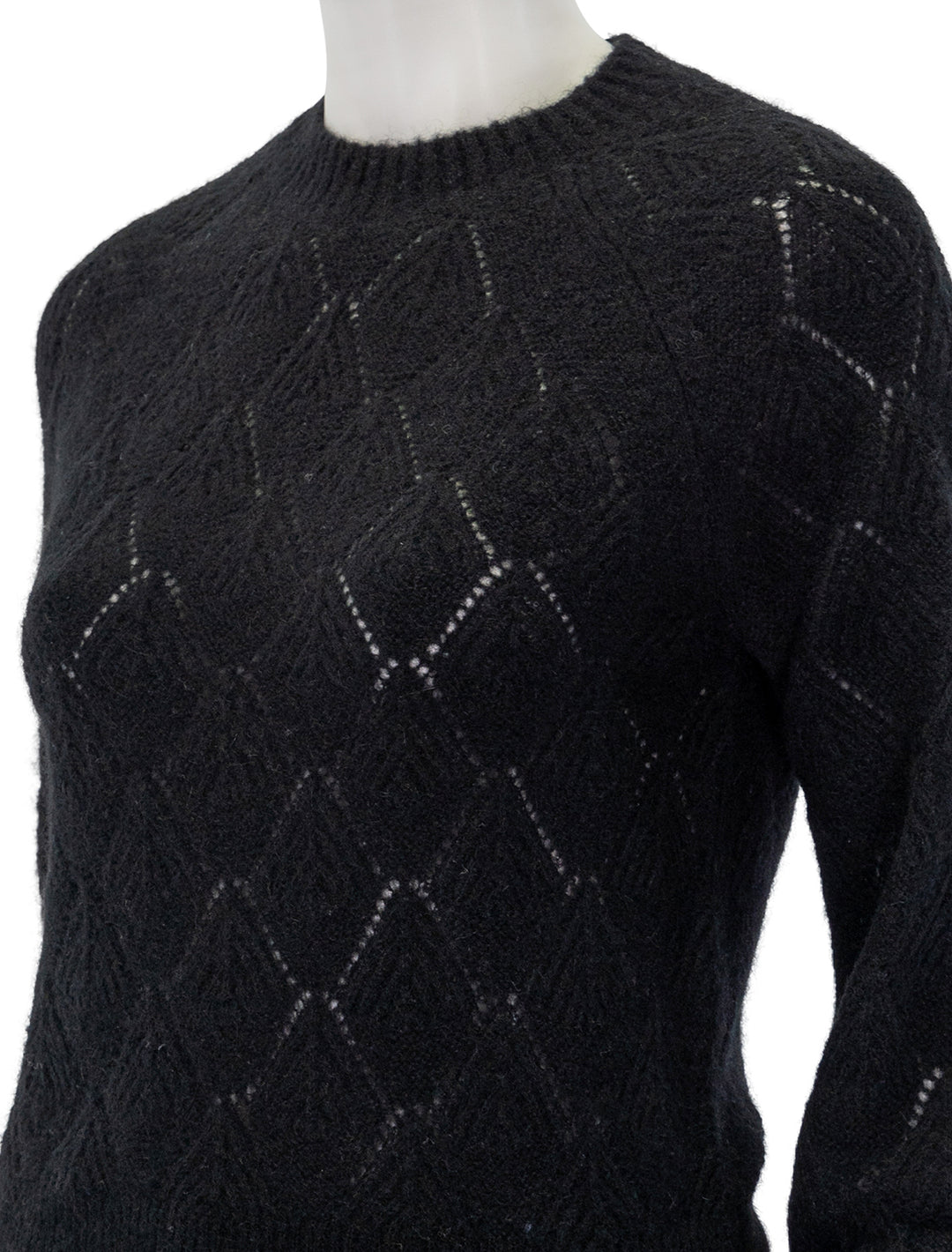 Close-up view of Lilla P.'s easy pointelle crewneck sweater in black.