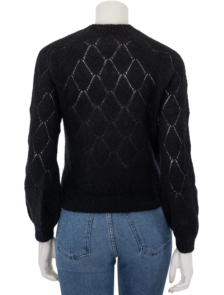 Back view of Lilla P.'s easy pointelle crewneck sweater in black.