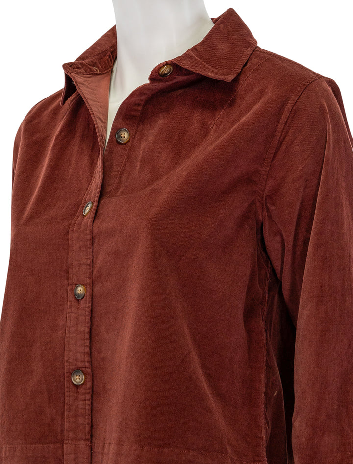 Close-up view of Lilla P.'s corduroy button down shirt in brandy.