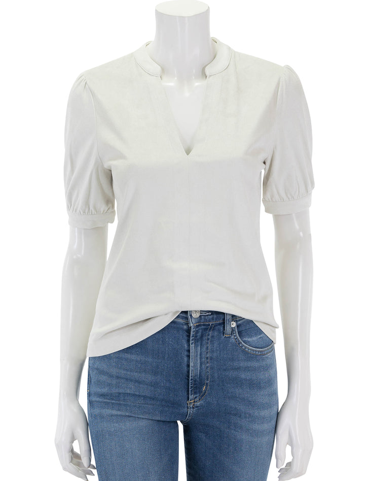 Front view of Steve Madden's jane top in off white faux suede.