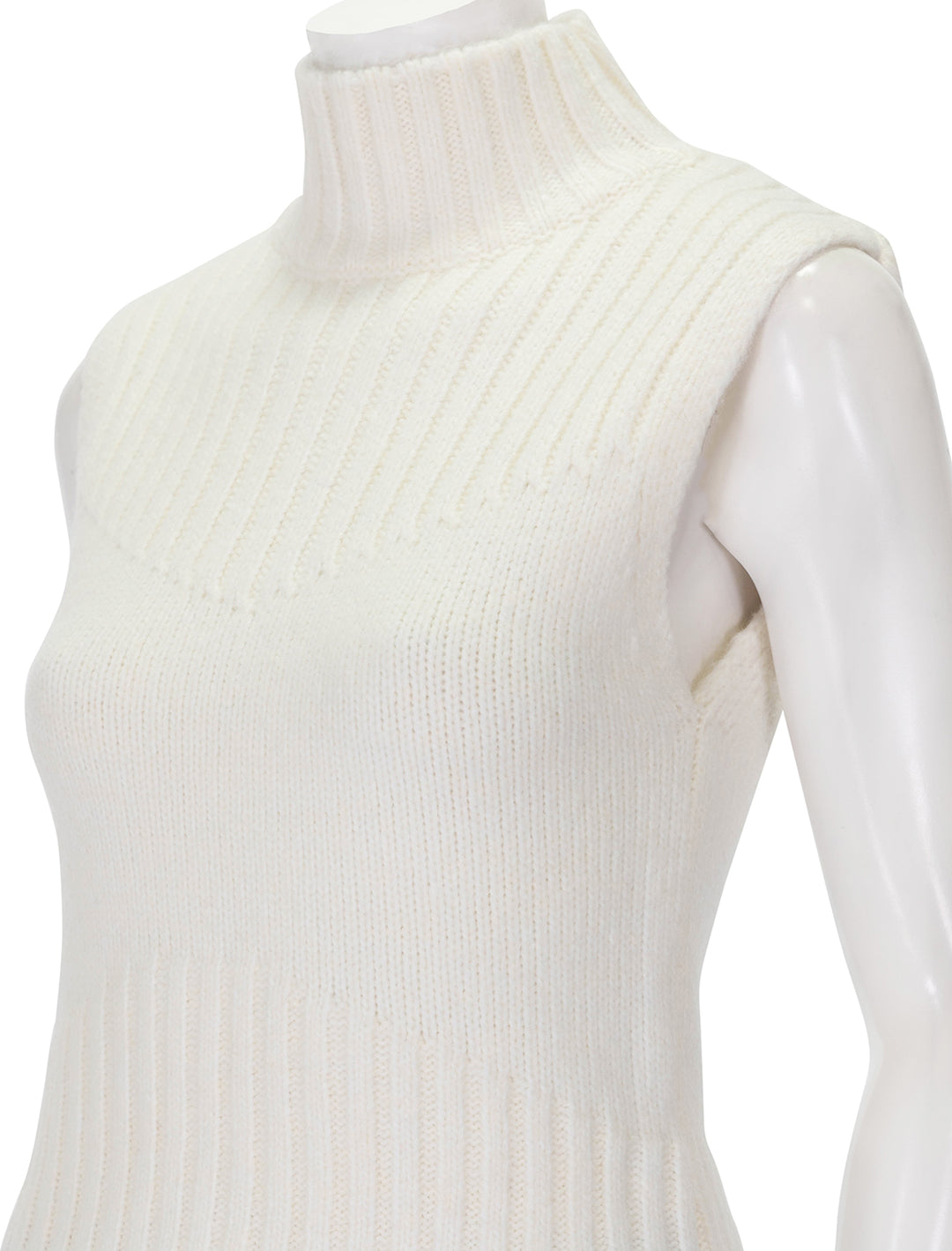 Close-up view of Steve Madden's serin sweater in cream.