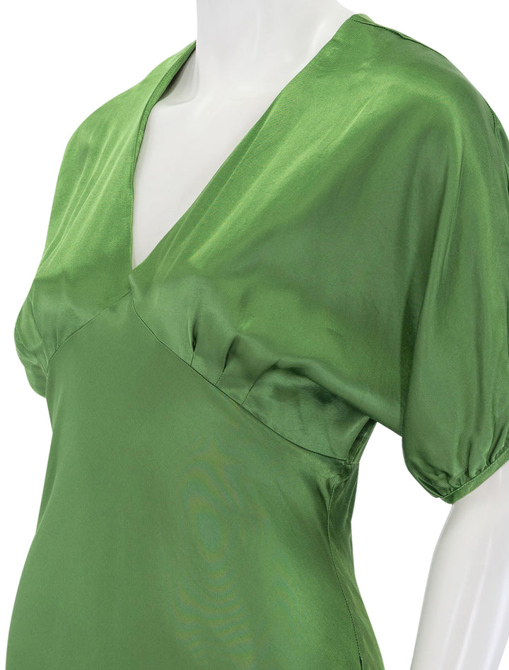 Close-up view of Nation LTD's lily-rose dress in salon green.