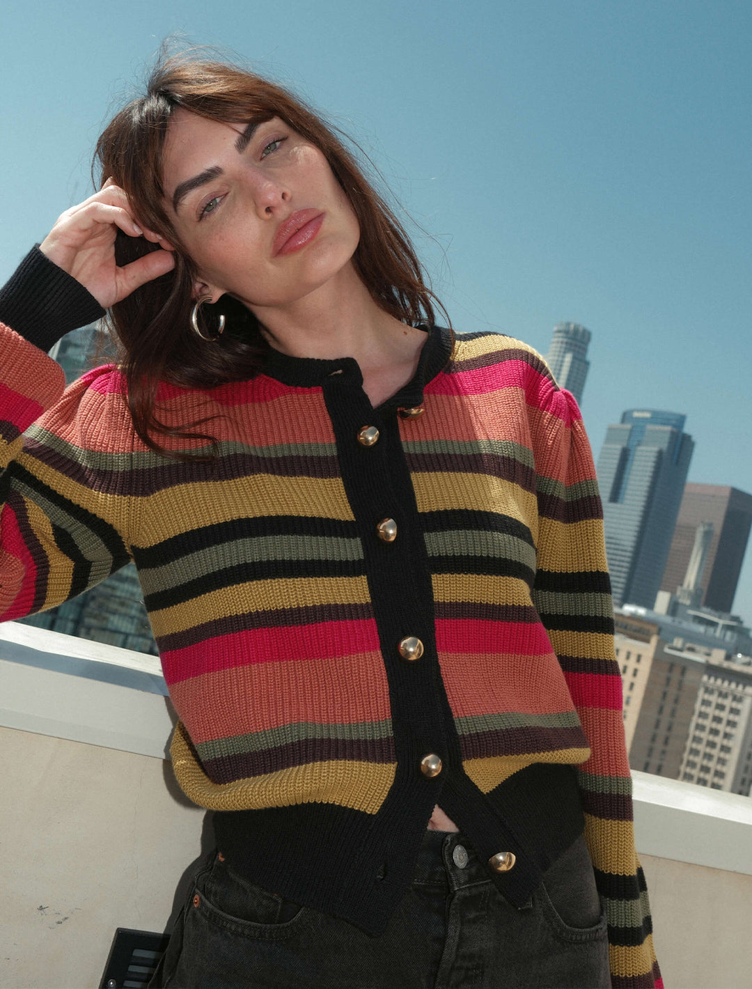 Model wearing Nation LTD's carmela cardigan in vintage stripe.