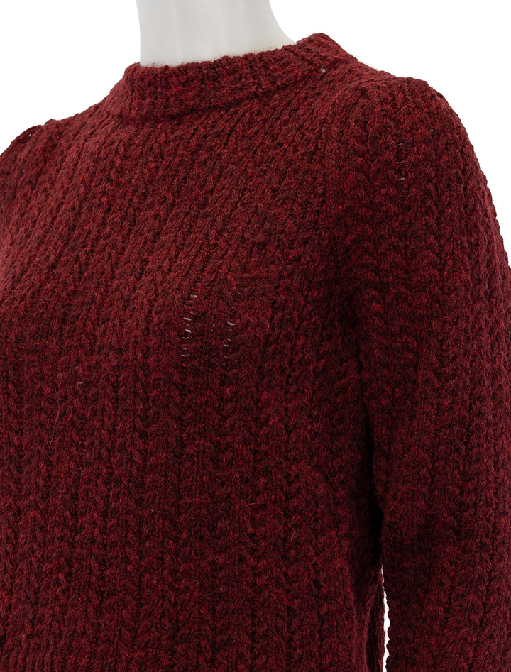 Close-up view of Nation LTD's eboni mock neck sweater in danish red.