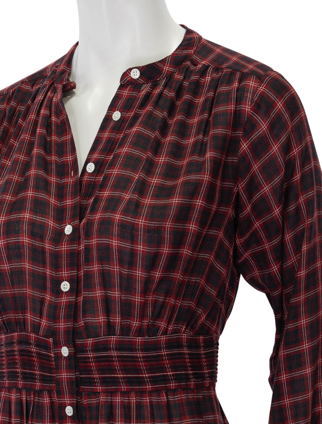 Close-up view of Doen's annika dress in red countryside plaid.