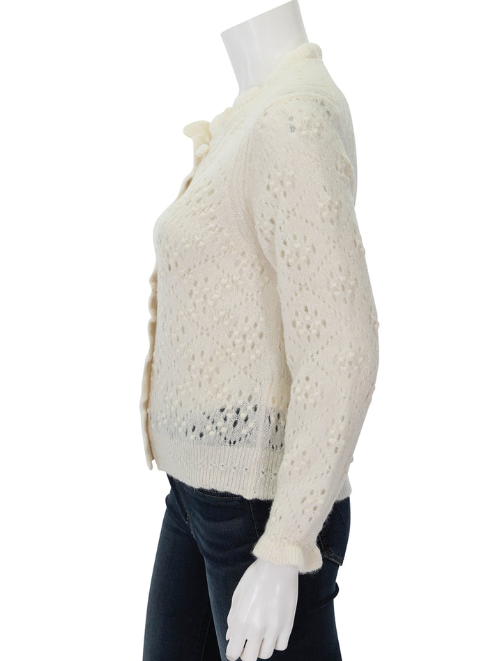 Side view of Doen's claudie cardigan in ivory.