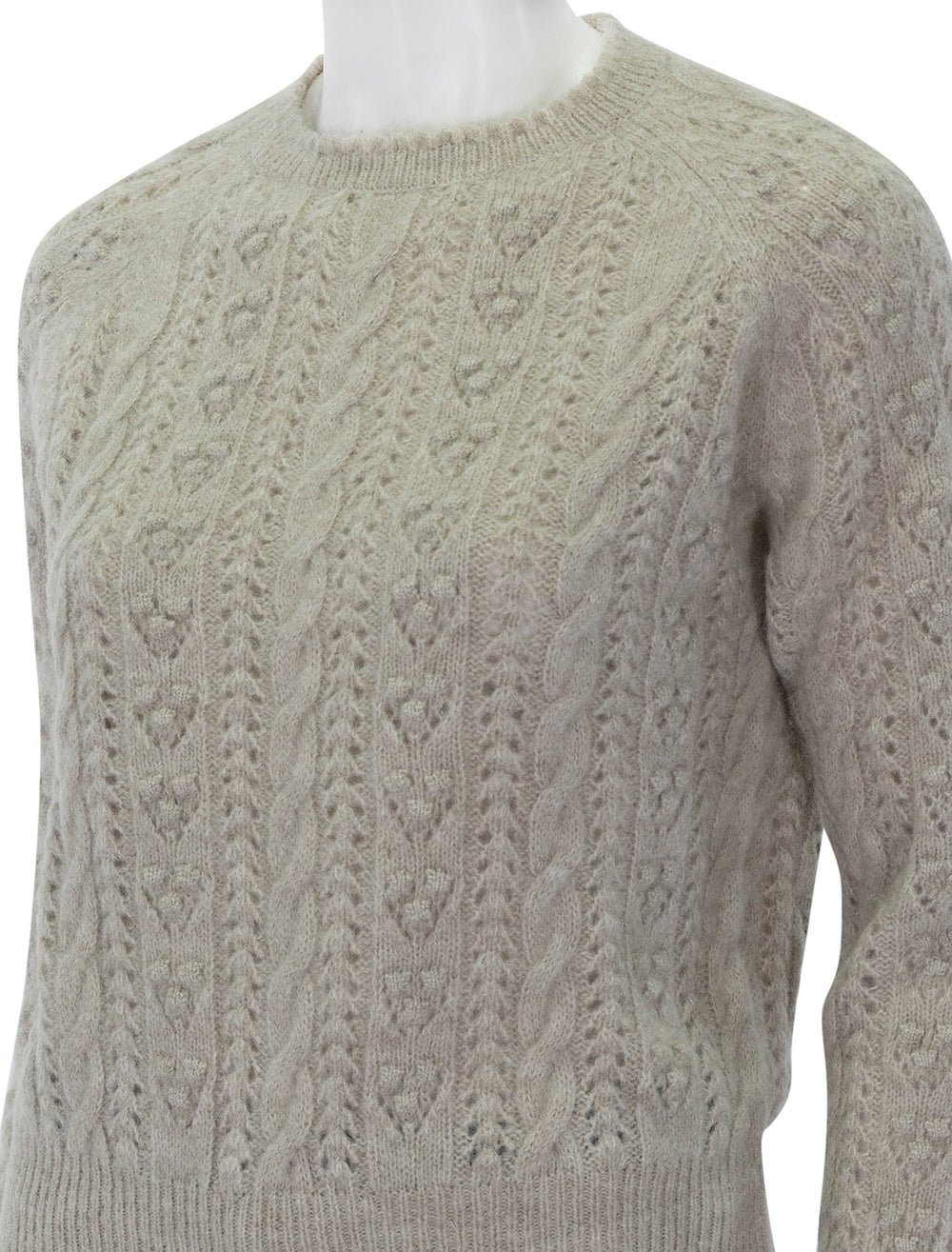 Close-up view of Doen's langley sweater in earl grey.