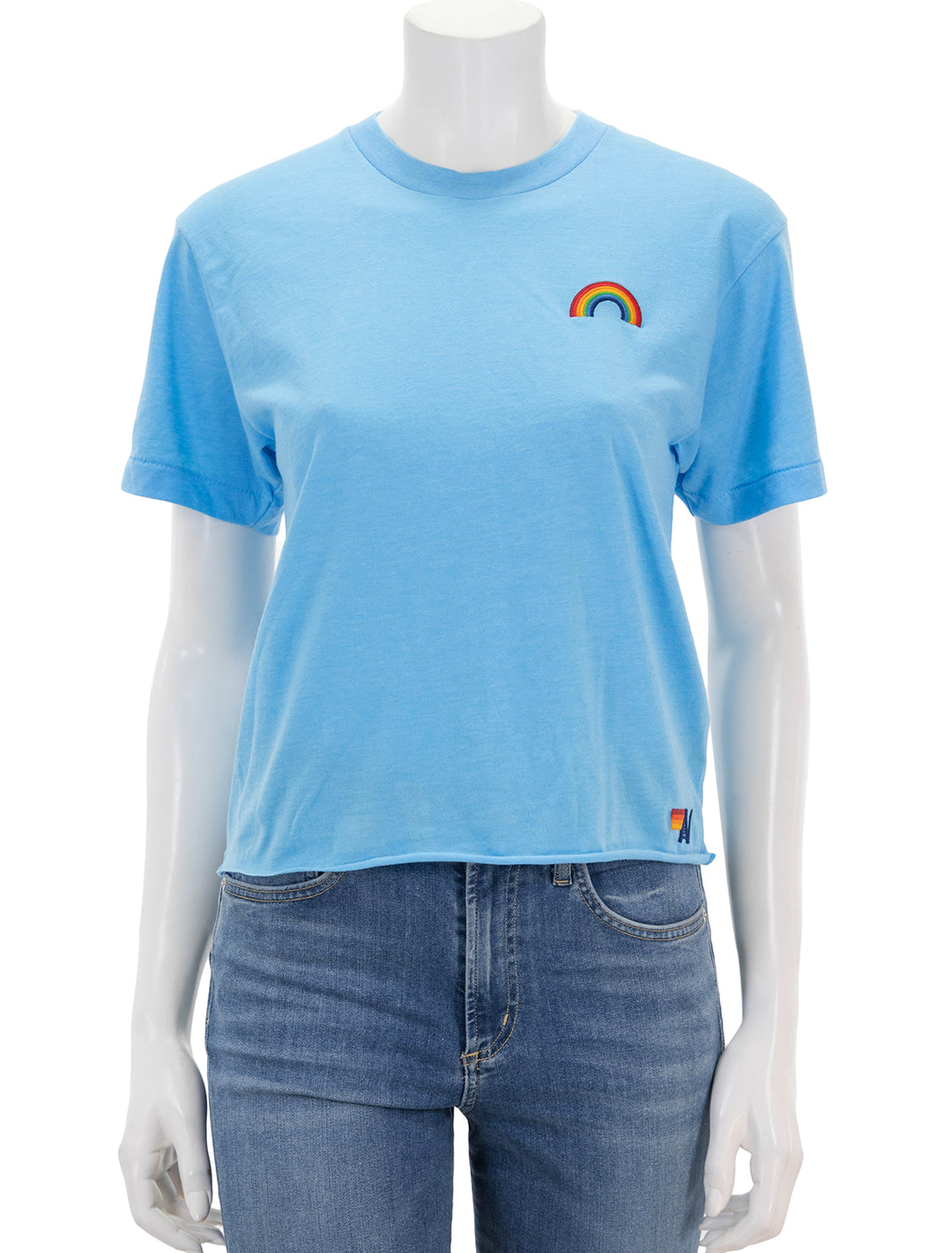 Front view of Aviator Nation's rainbow embroidery boyfriend tee in sky.