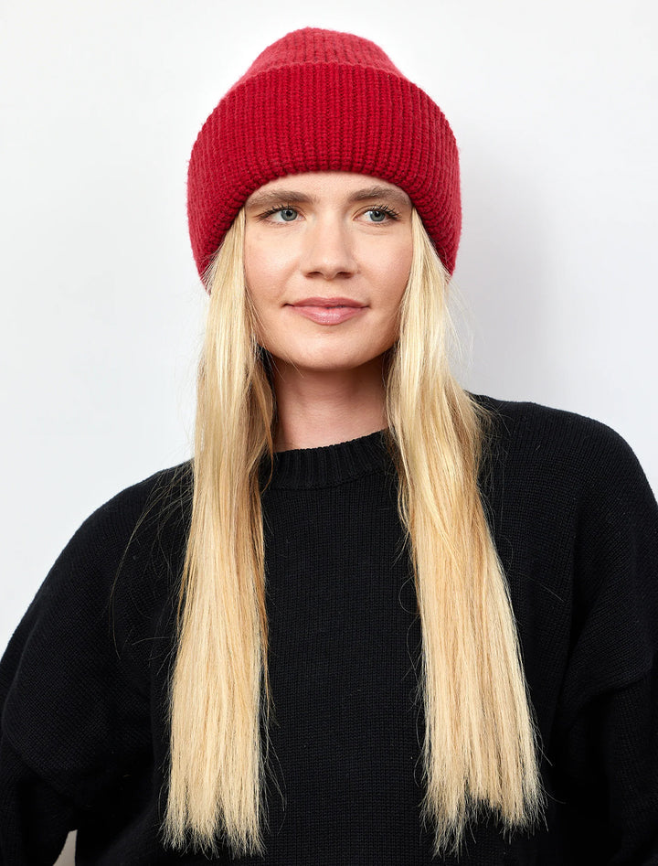 Model wearing Hat Attack's major beanie in garnet.