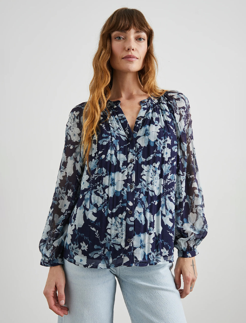 Model wearing Rails' nessie blouse in indigo blossoms.
