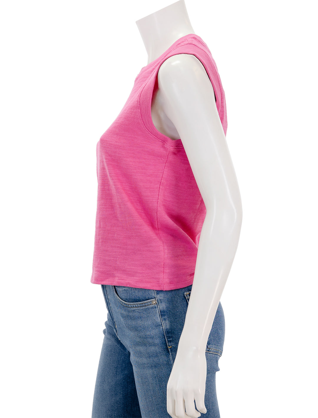 Side view of Faherty's sunwashed slub muscle tank in cone flower pink.