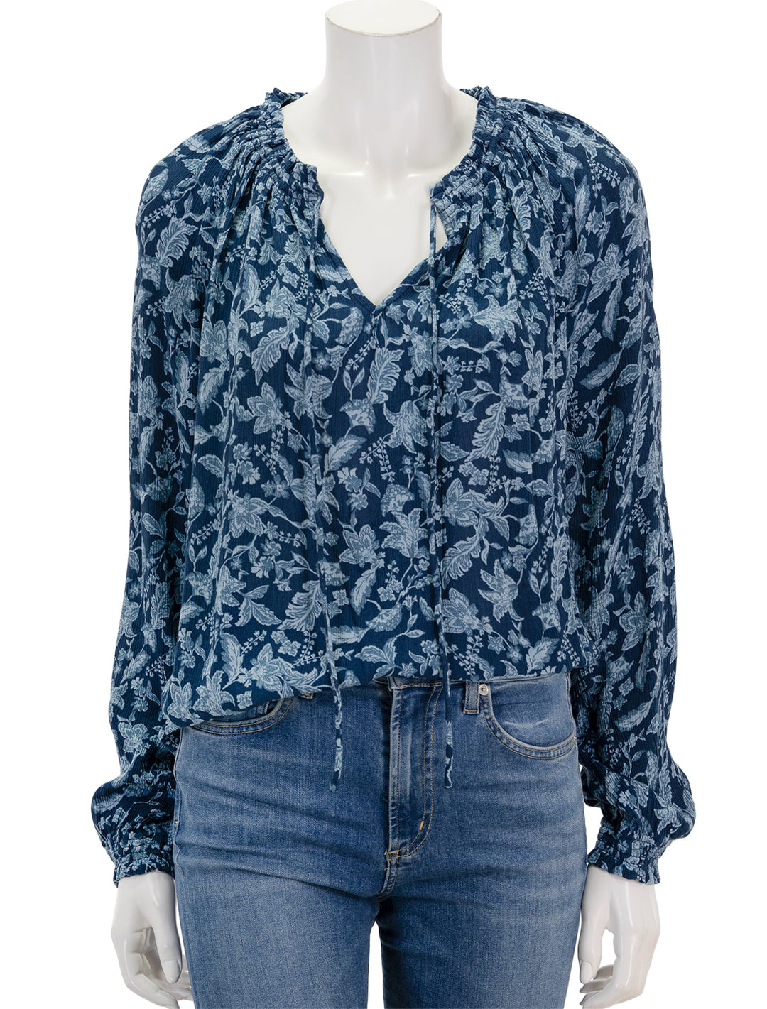Front view of Faherty's emery blouse in blue esna floral.