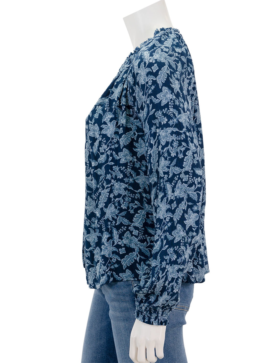 Side view of Faherty's emery blouse in blue esna floral.