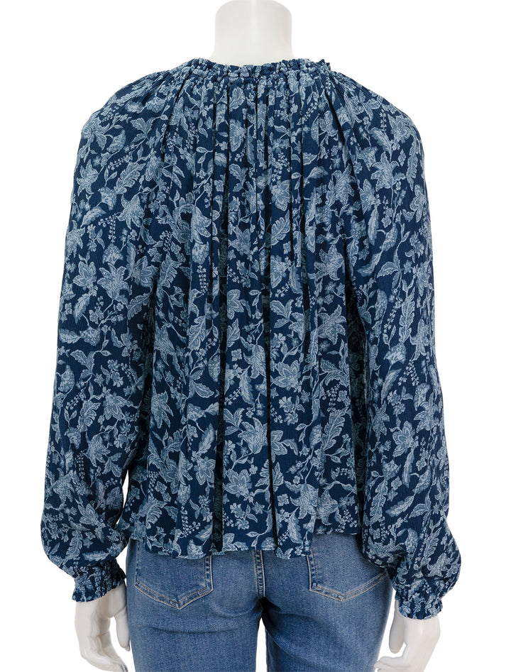 Back view of Faherty's emery blouse in blue esna floral.