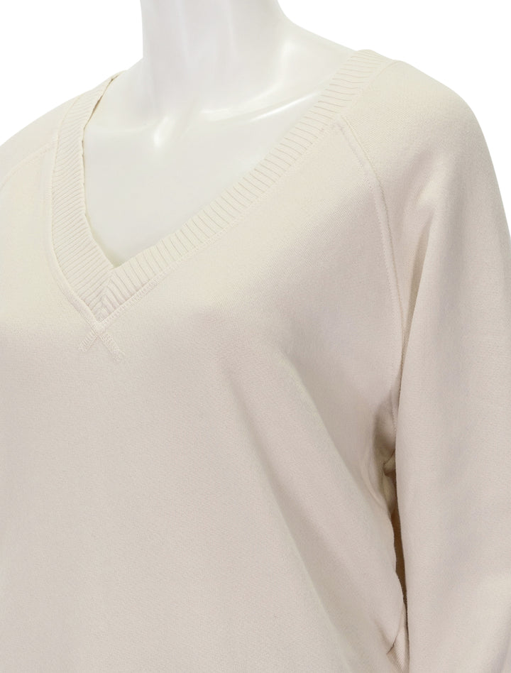 Close-up view of Perfectwhitetee's dakota v-neck sweatshirt in sugar.