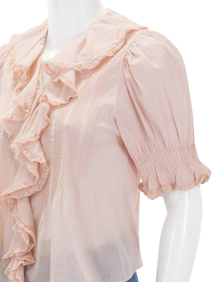 Close-up view of DOEN's henri top in blush.
