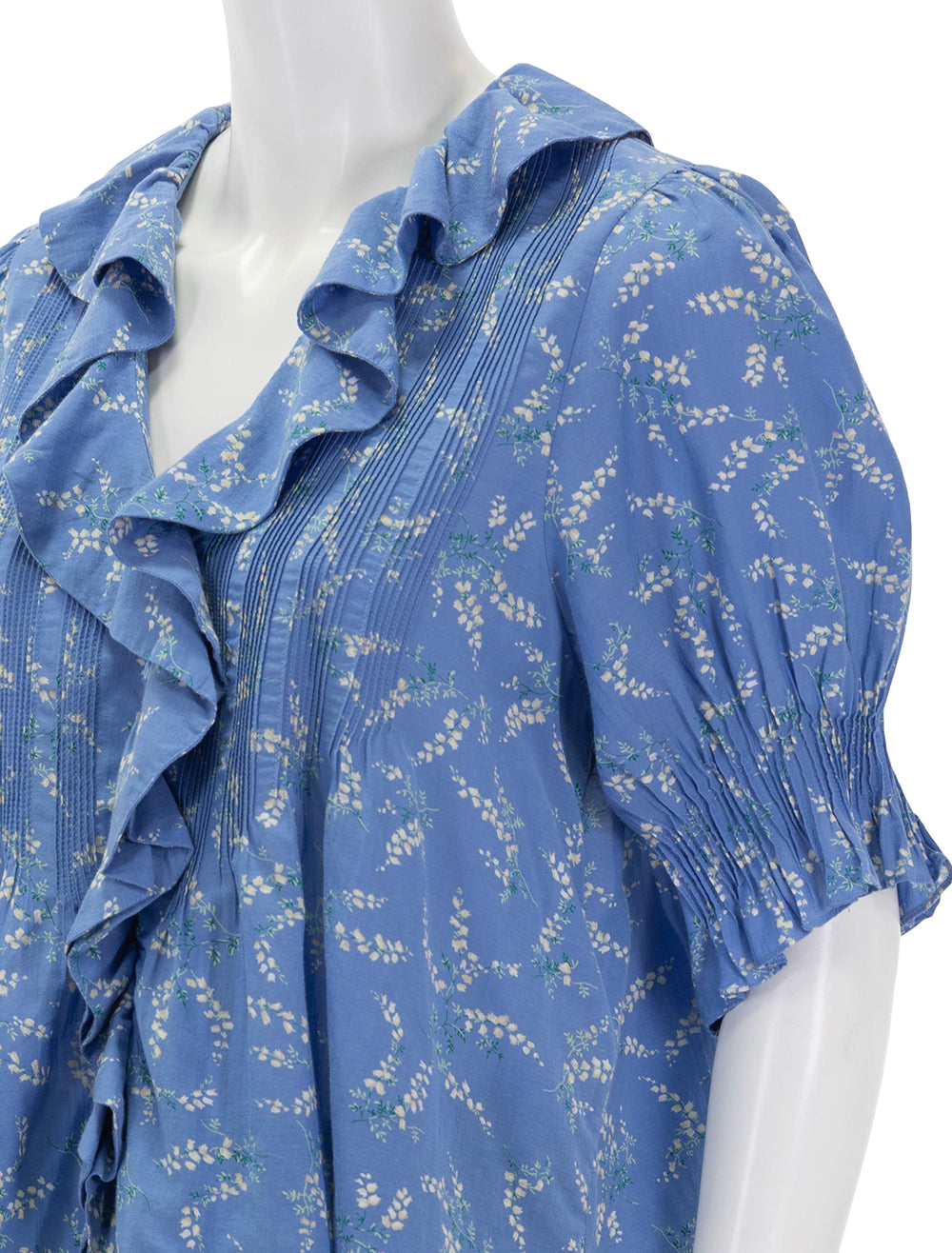 Close-up view of DOEN's henri top in lapiz bluebell ballad.
