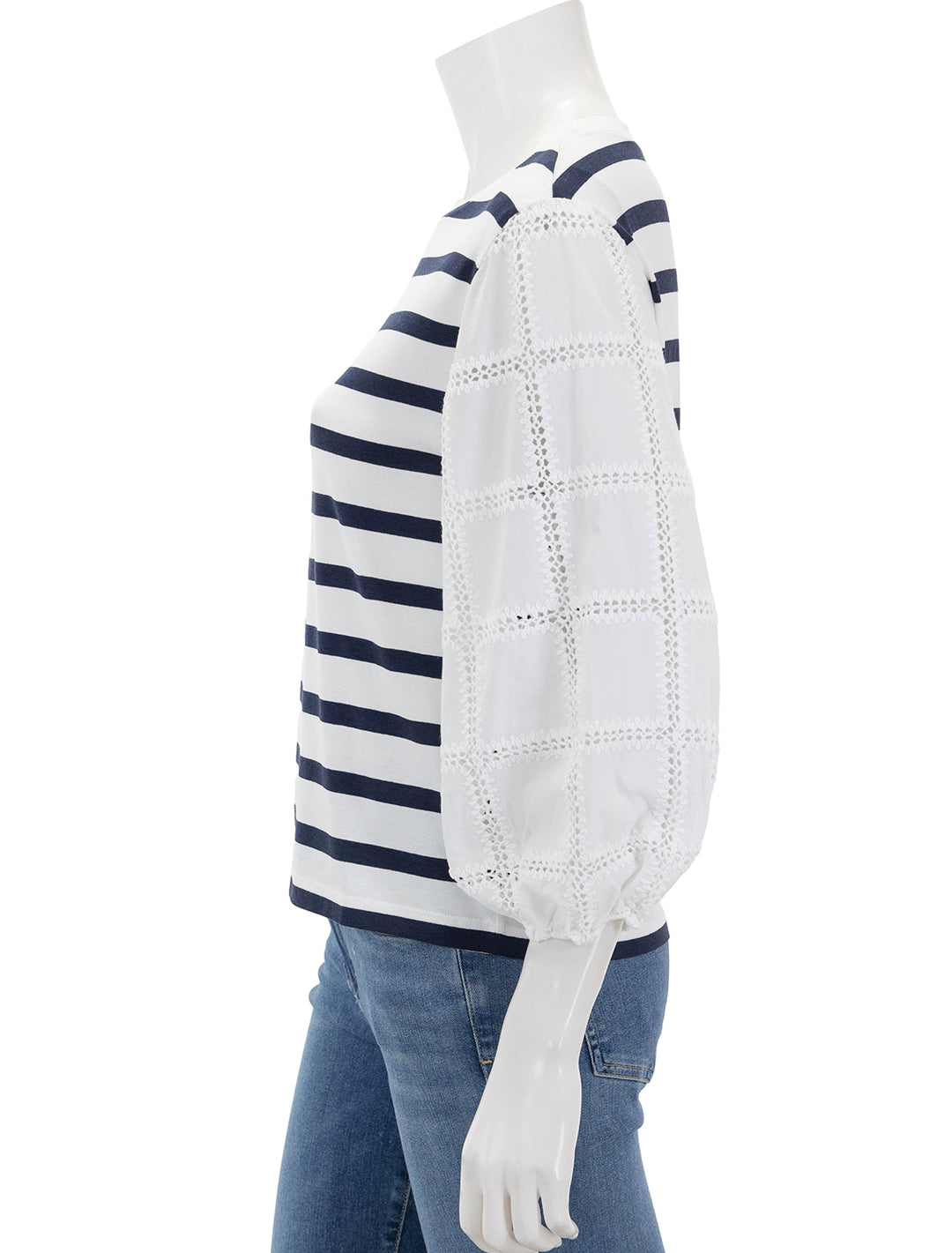 Side view of Vilagallo's eugen top in navy and white.