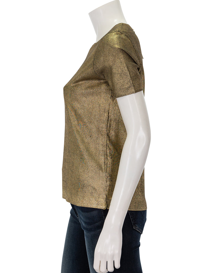 Side view of Minnie Rose's viscose metallic print crew tee in gold.