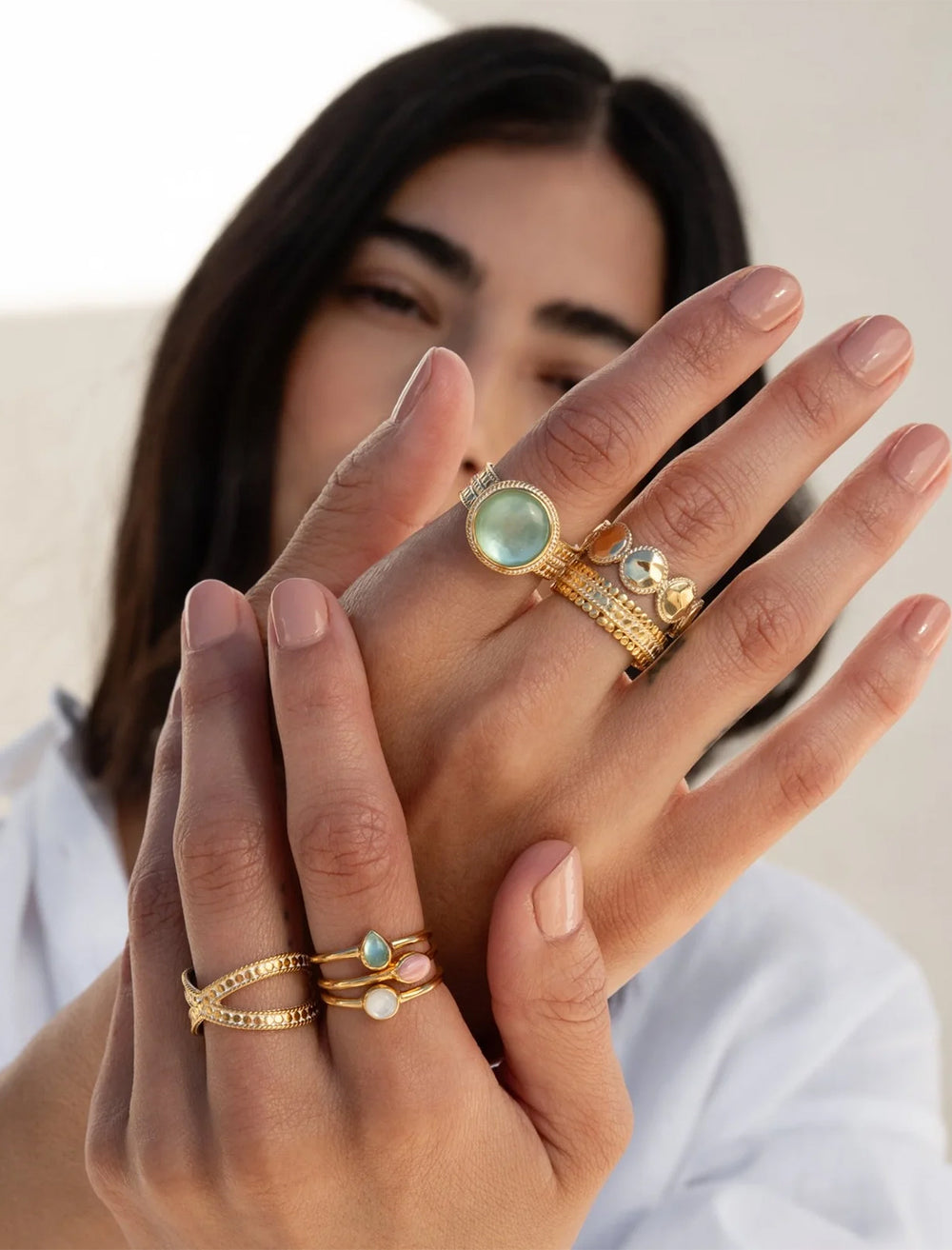 model wearing green quartz cocktail ring in gold