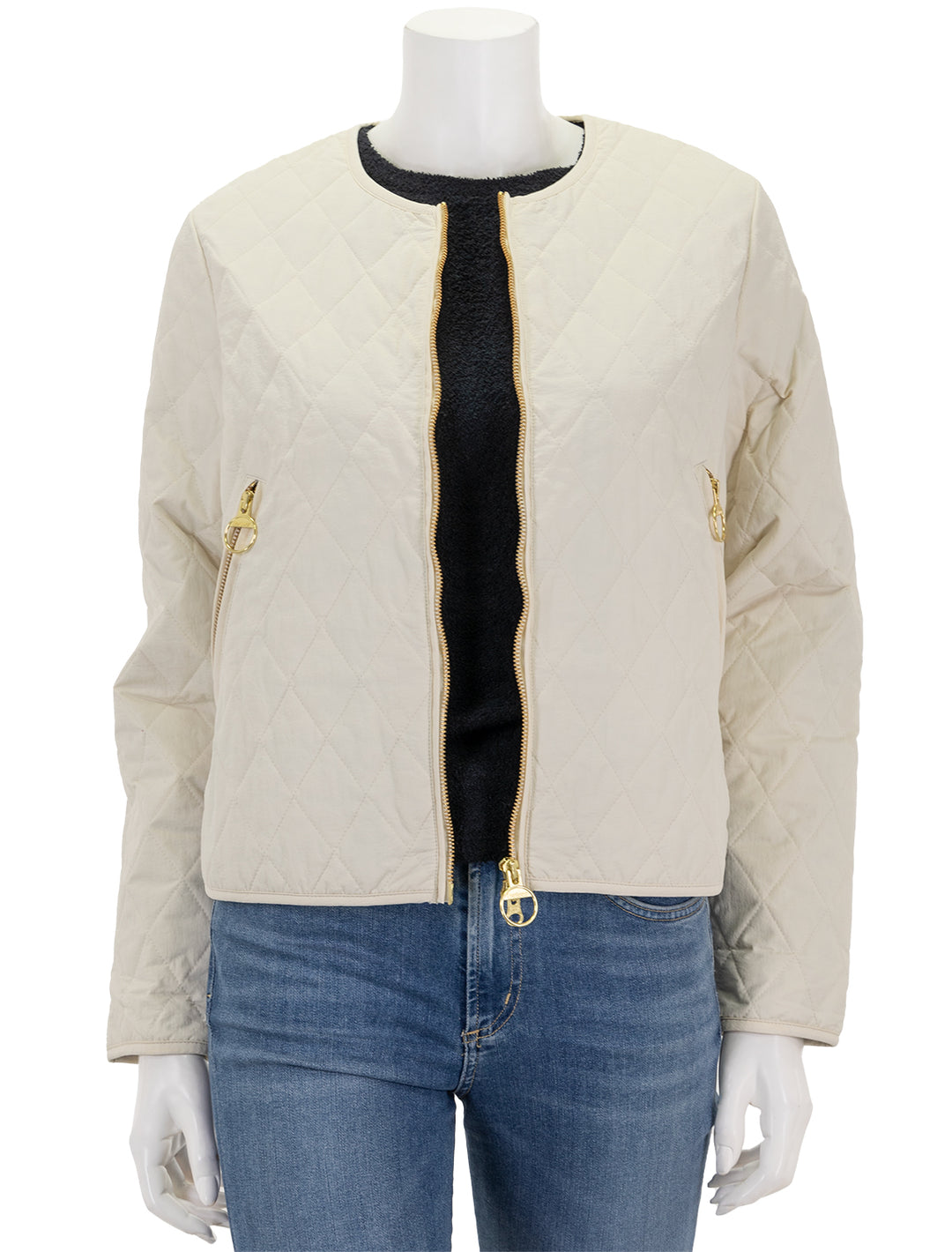 Front view of Barbour's caroline quilted jacket in antique white.
