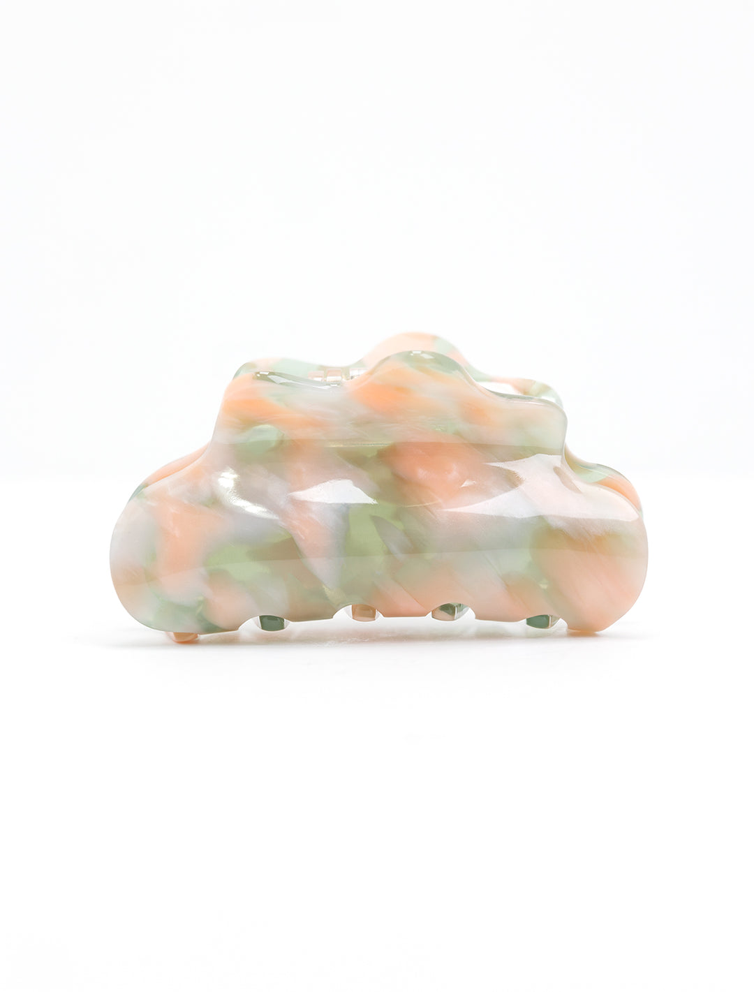 Side view of tiepology's eco cloud hair claw in blush sage.