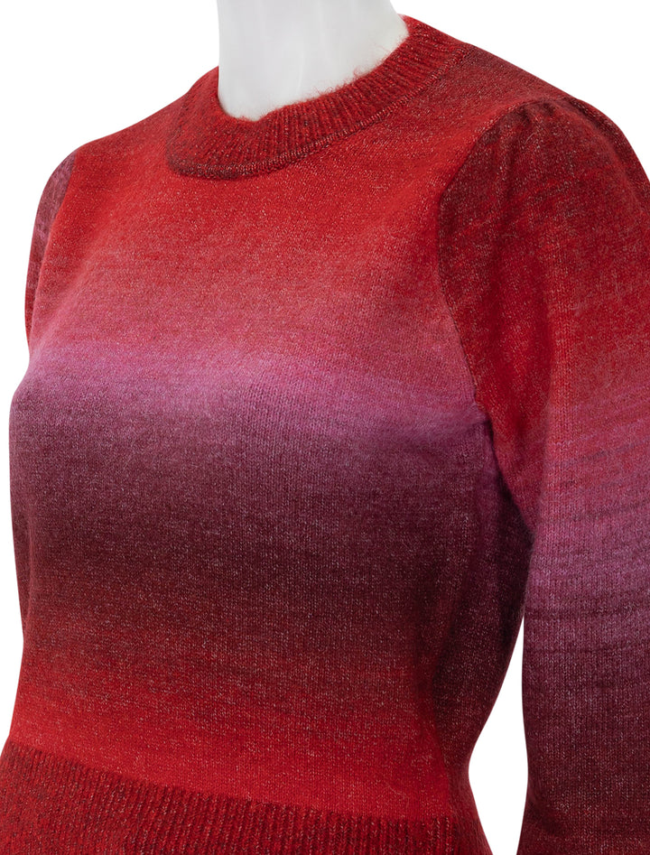 Close-up view of Marine Layer's alma puff sleeve sweater in warm ombre.