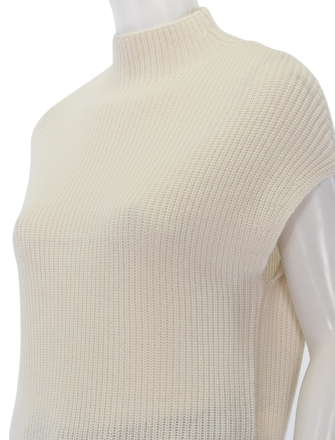 Close-up view of Lilla P.'s ribbed funnel neck sweater in ivory.