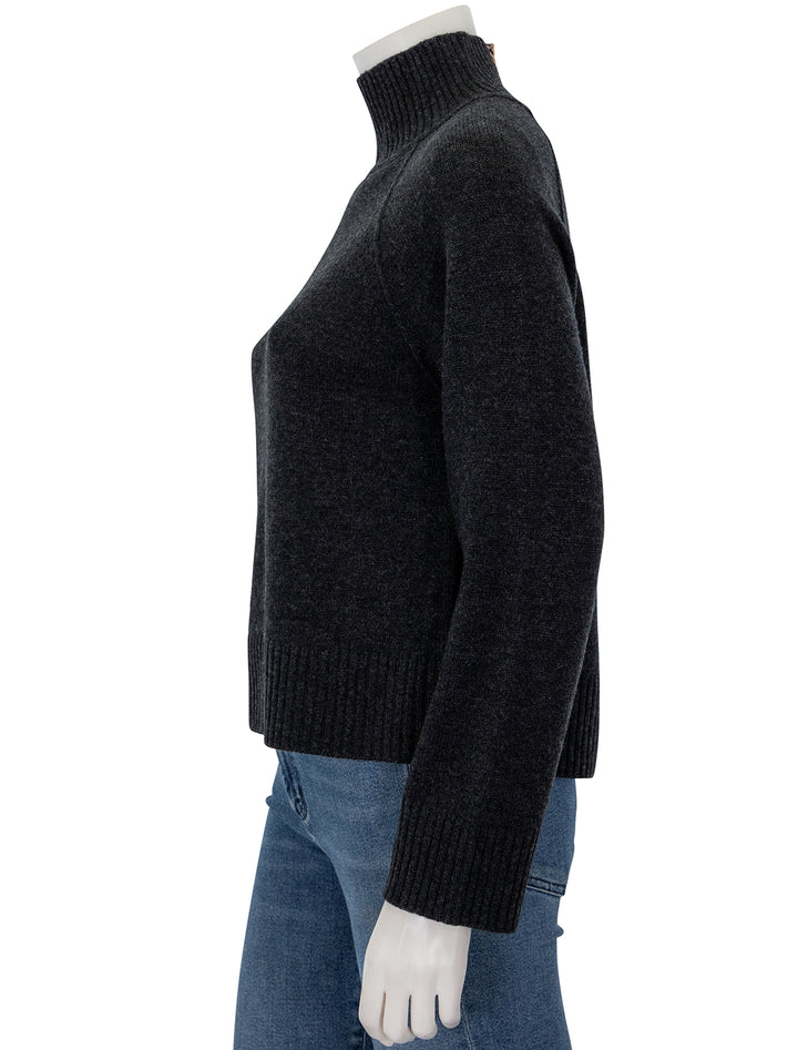 Side view of Lilla P.'s turtleneck sweater in caviar.