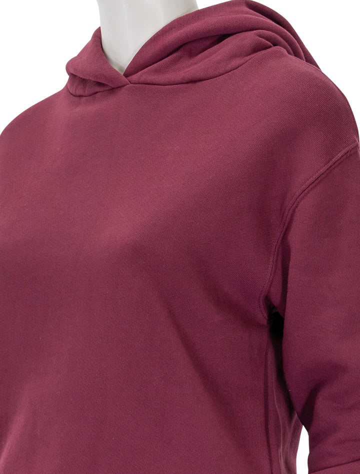 Close-up view of Perfectwhitetee's heart hoodie in cranberry.