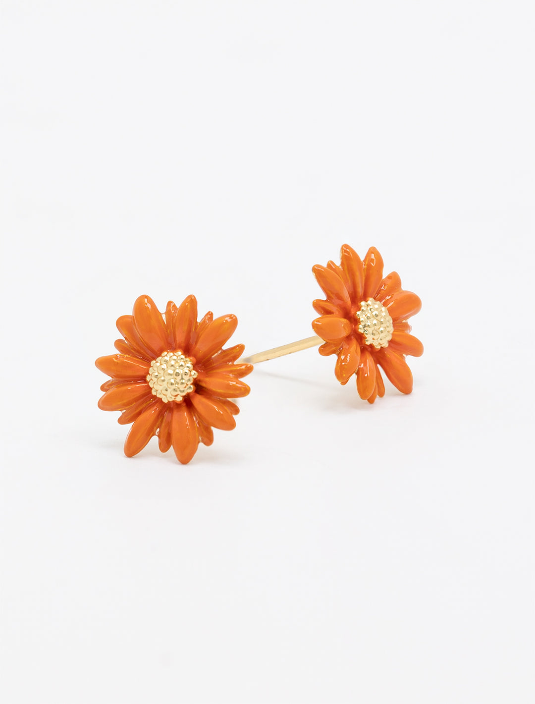 Close-up view of Tai's gerbera daisy studs.