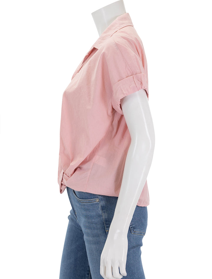 Side view of Stateside's voile s/s twist front shirt in lipstick pink.