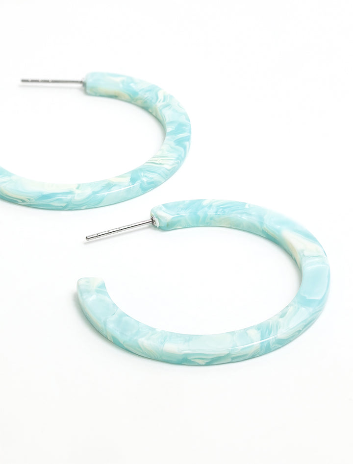 Laydown of S&S's camy hoops in aquamarine.
