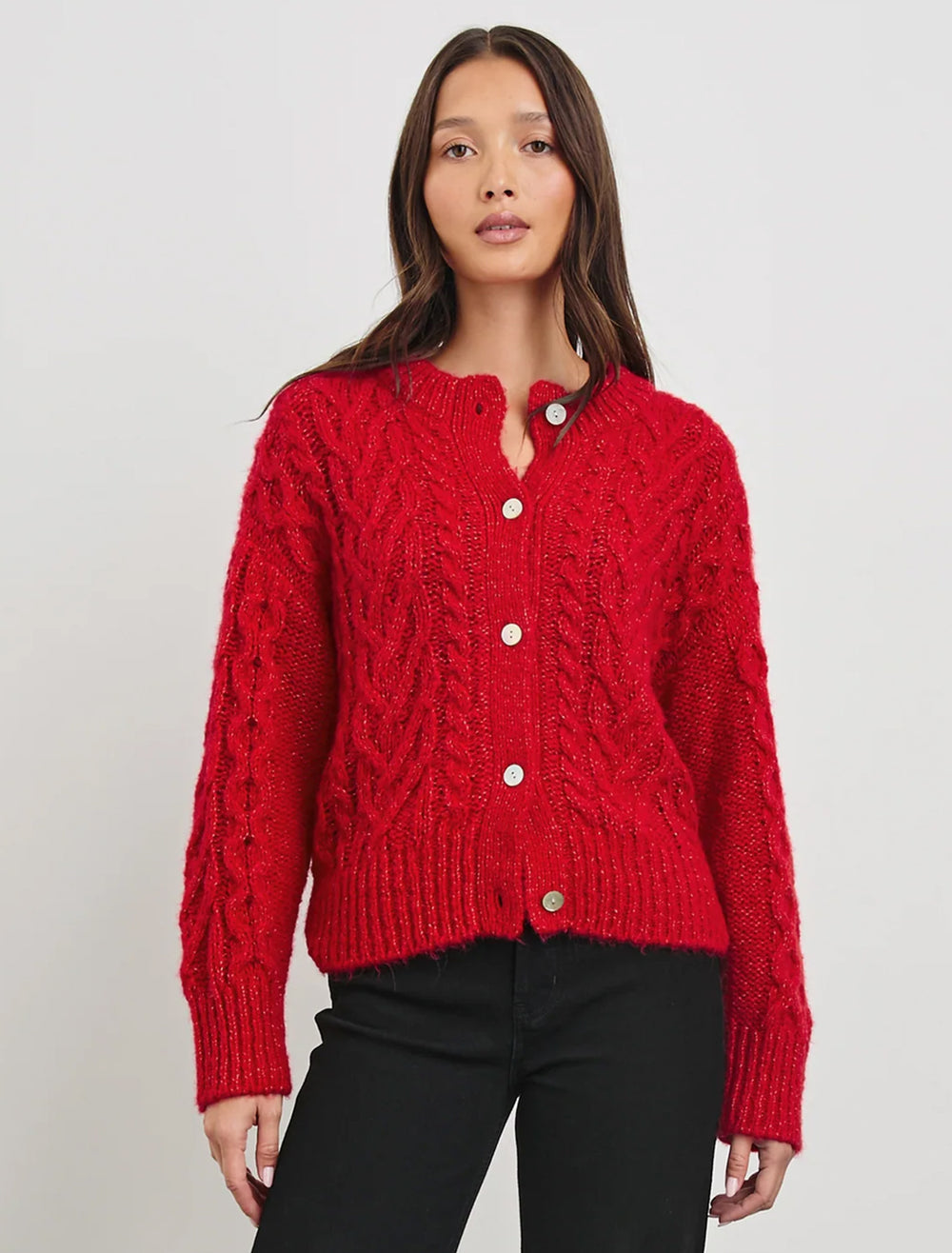 Model wearing Rails' amelie cable knit cardi in scarlet.