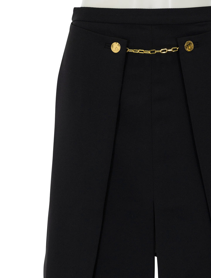 Close-up view of GANNI's twill suiting skirt in black.