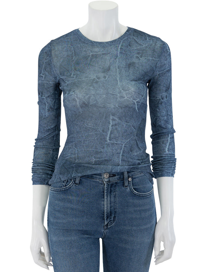 Front view of GANNI's marl mesh long sleeve crew neck blouse in denim.