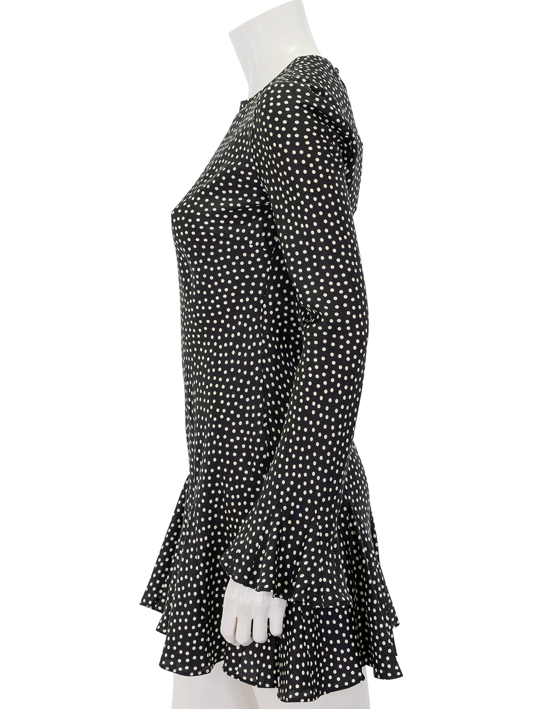 Side view of Doen's narcisse dress in scattered dot print.