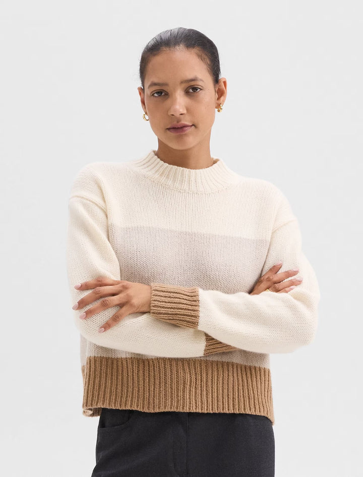 model wearing coloblock pullover in ivory multi