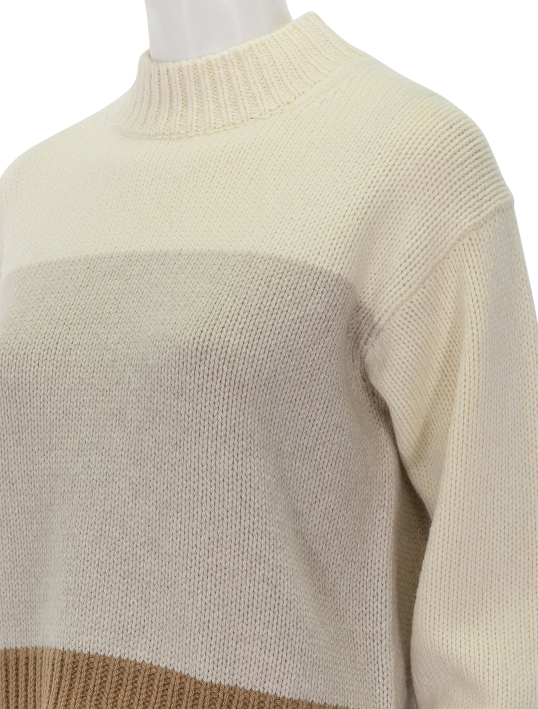 close up view of coloblock pullover in ivory multi