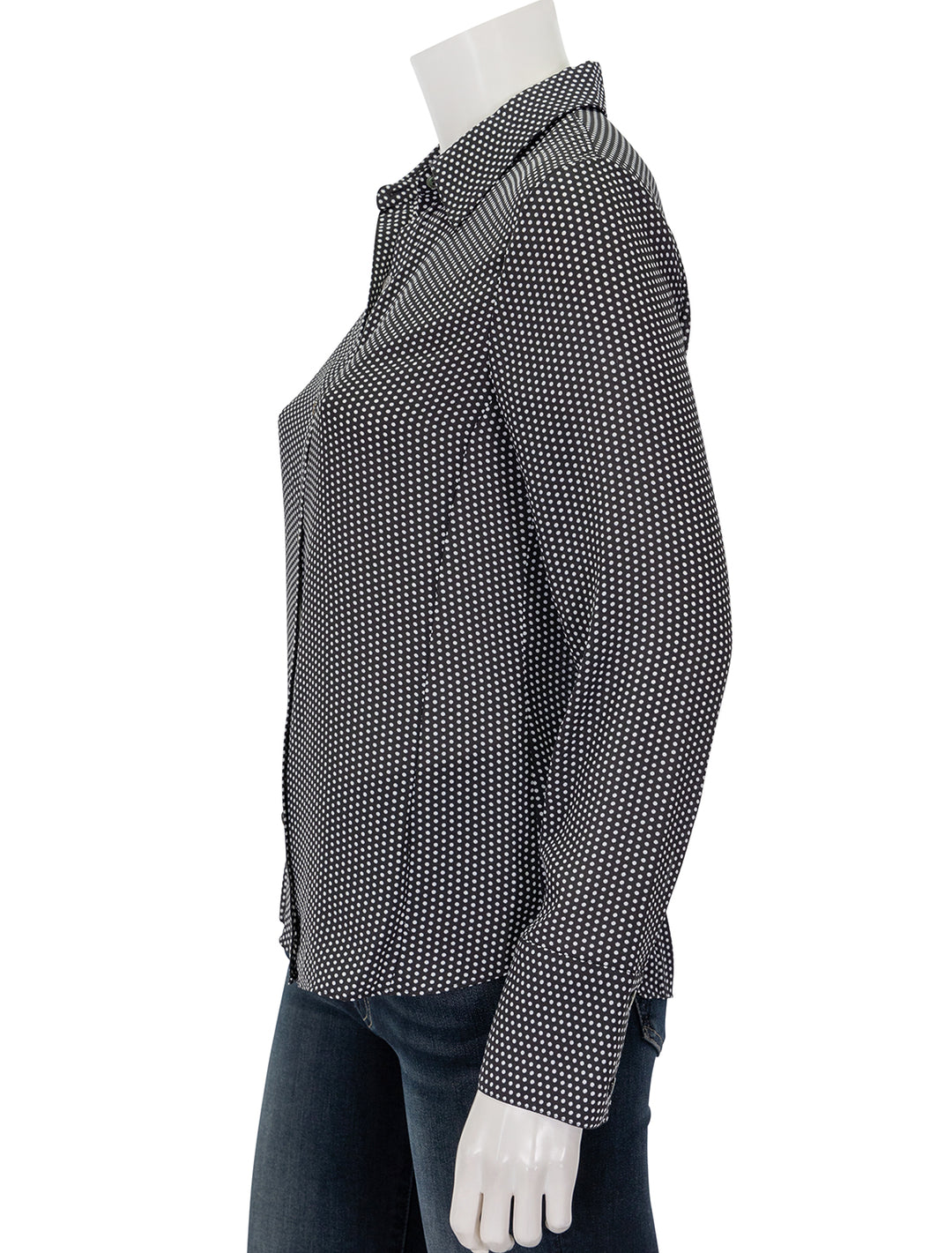 Side view of Theory's slim button down in black and white pindot.