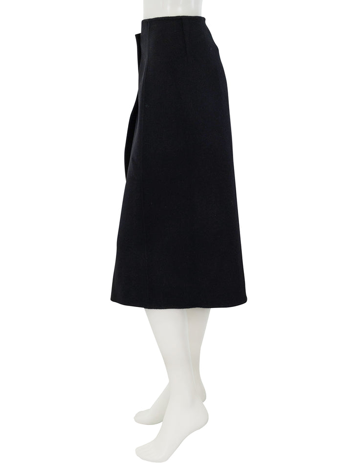 Side view of Alex Mill's parker midi skirt in black.