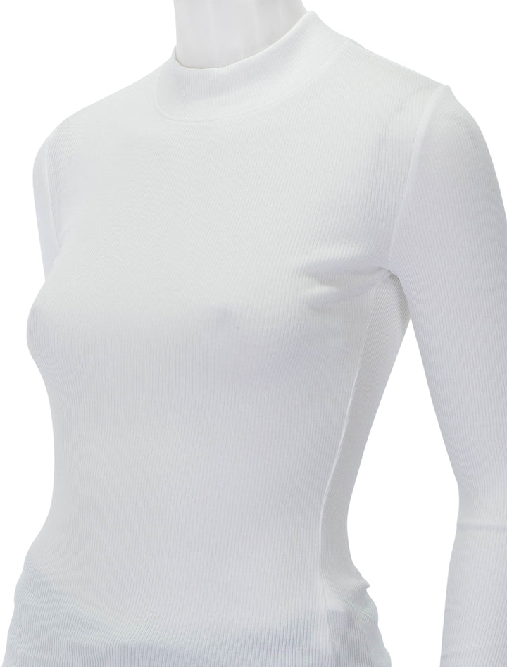 Close-up view of Nation LTD's gina slim mock neck in white.