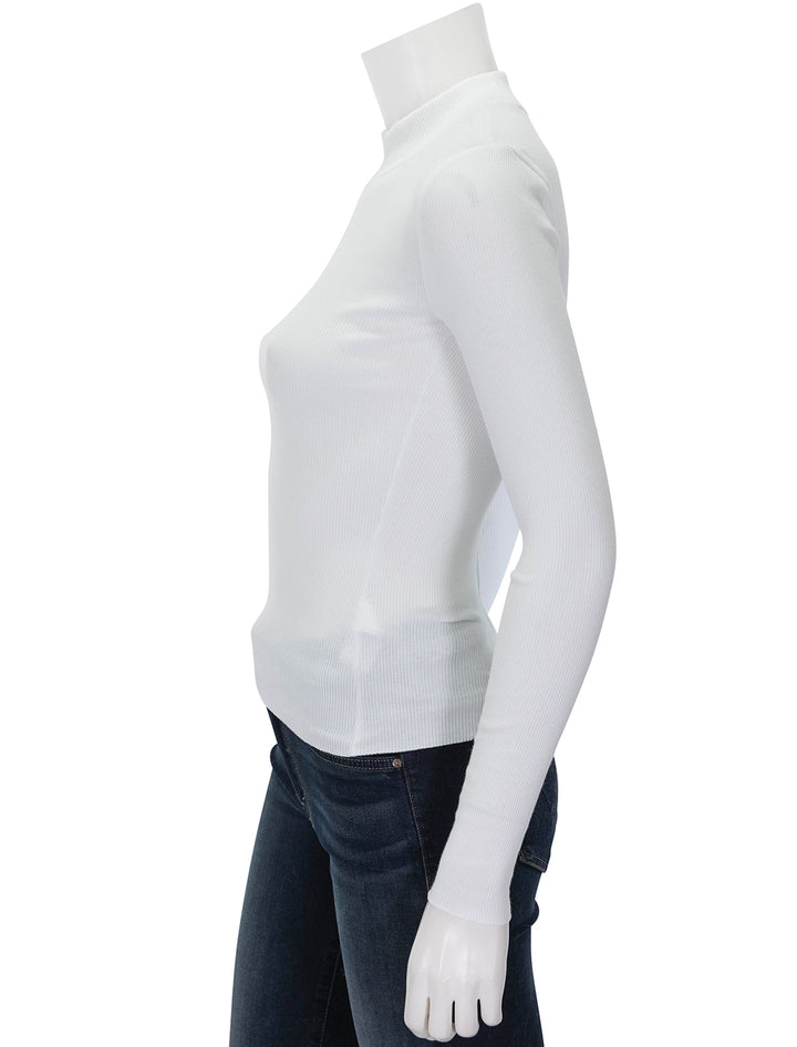 Side view of Nation LTD's gina slim mock neck in white.