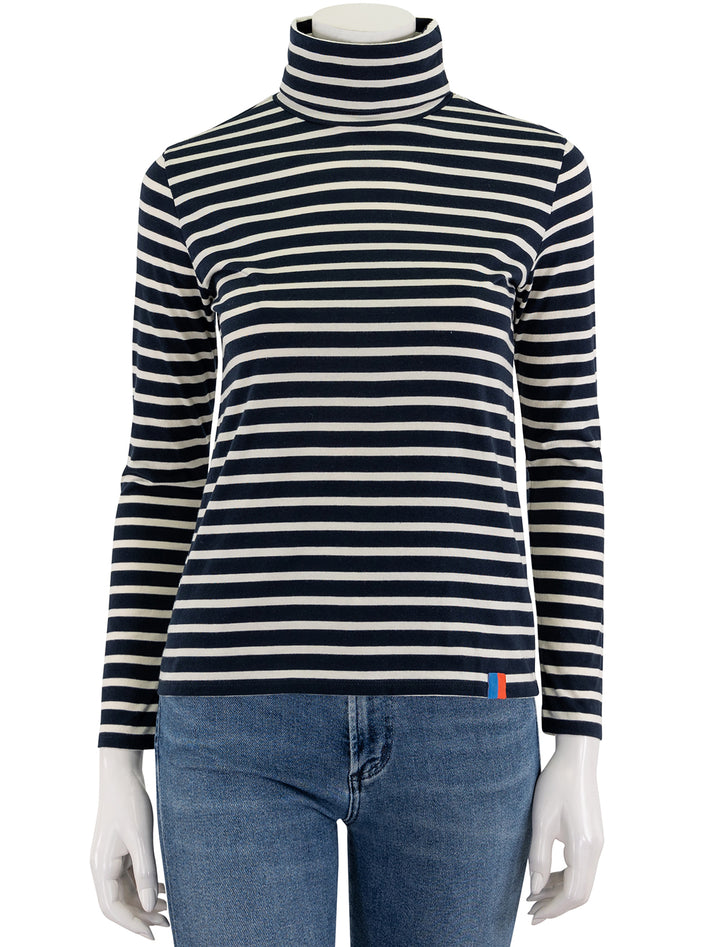 the turtleneck in navy and cream