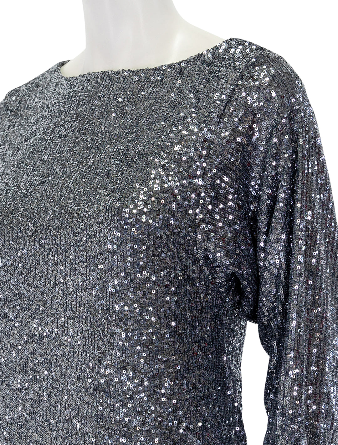 Close-up view of Steve Madden's ginger dress in silver grey.