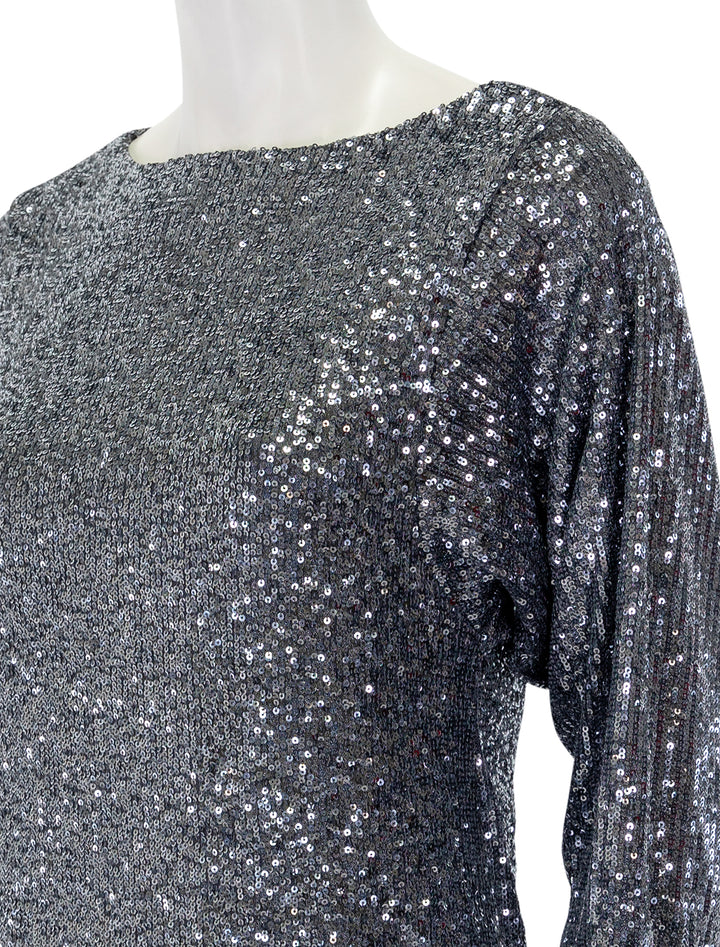 Close-up view of Steve Madden's ginger dress in silver grey.