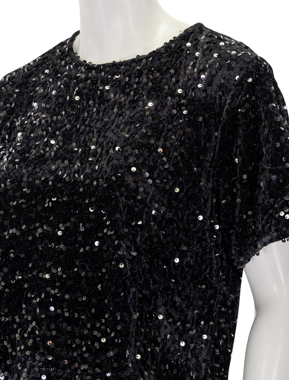 Close-up view of Steve Madden's cressa top in black.